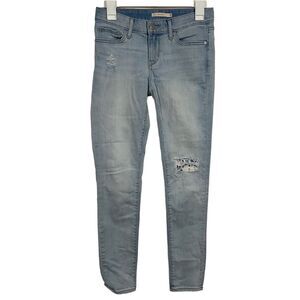 Levi’s Light Wash Distressed Skinny Jeans